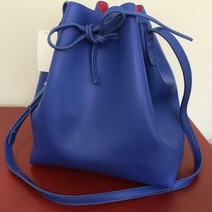 Blue and magenta drawstring hobo bag